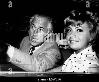 Actor Stewart Granger in the car with woman Stock Photo