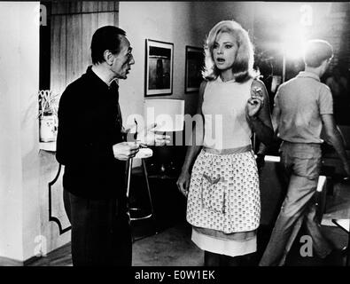 Italian film star Virna Lisi appears out of a giant cake in her first ...