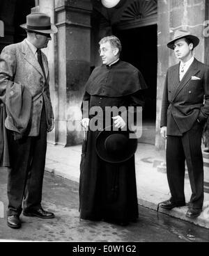 Actor Alec Guinness in a film as Father Brown Stock Photo