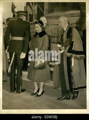 Mar. 03, 1961 - The Queen visits Kingston: Queen Elizabeth II is received by Lord Hamilton of Dalzell, Her Majesty's vice-Lieutenant for the county of Surrey, as she arrives at Guildhall during her visit to the Royal Borough of Kingston upon Thames, Surrey today, March 24. at right is Alderman E.C. Levett, who deputised for the mayor today. Stock Photo