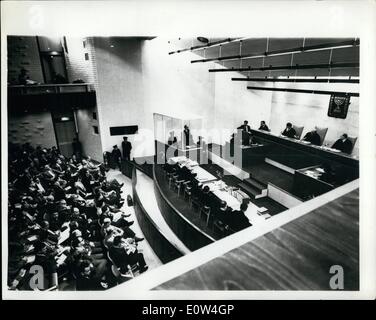 Apr. 04, 1961 - Trial of Adolf Eichmann continues in Jerusalem : The trail continues in Jerusalem of Adolf Eichmann - former Nazi S.s. Colonel - on the charges of mass murder of millions of Jews - in Nazi concentration camps during the war. photo shows General view during the trial showing Eichmann in his bullet - proof dock - Tribunal to the right - and defense and prosecution counsels faction the tribunal. Stock Photo