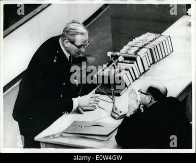 Apr. 04, 1961 - Trial Of Adolf Eichmann Continues in Jerusalem: Trial continues in Jerusalem of Adolf Eichmann former nazi s.s.-on charges of mass murder of jews-in Wartime concentration camps. Photo shows. The Attorney General-Dr. Gideon Havsner-talks with a police officer. Stock Photo