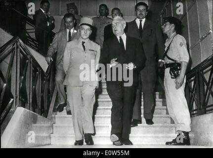Jun. 20, 1961 - After arriving last night in Algeria, Louis Joxe has already started work in the General Delegation building. Joxe is pictured going down the stairs of the General Delegation building in Algeria with General Olie after the first meeting. Stock Photo