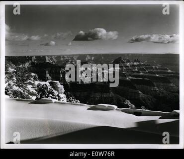 Dec. 12, 1961 - This rare picture of the Grand Canyon under a mantle of snow was taken from the veranda of the lodge on the Chasm's North Rim. However, it is a daily view for Mr. and Mrs. Louis Hillis, who are spending an isolated winter there to keep the resort in shape for next summer's Influx of vacationists. The photographer who took the picture had to travel 44 miles by Sno-Cat through the Kaibas National Forest. Stock Photo