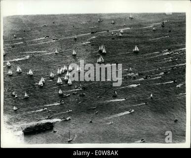 Jan. 01, 1962 - Astor Wins Sydney-Hobart Race The 73 ft. stay-sail schooner Astor won the ocean yacht race classic from Sydney to Hobart in New South Wales. Photo Shows:- An aerial view of the contestants, followed by almost every small craft in Sydney Harbor, moving through the Sydney Heads at the beginning of the race. Stock Photo