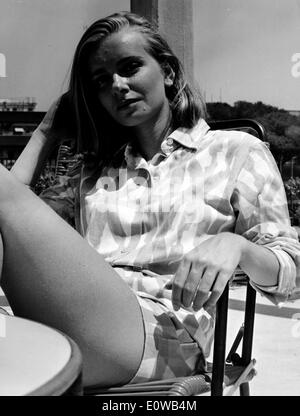 Actress Valeria Ciangottini sitting on a patio Stock Photo