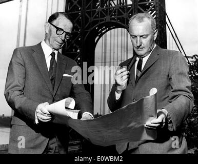 Engineers Othmar Amman and John Kyle look over plans Stock Photo