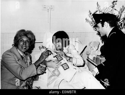 First Lady Claude Pompidou visits child in hospital Stock Photo