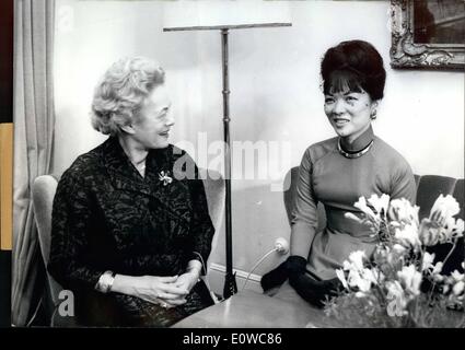 May 05, 1962 - Madame Ngo Dinh Nhu: who is said to be the most beautiful politician of the world and who is sister-in-law of the South-Vietnam State President Ngo Dinh Diem, visited on May 11th the wife of German Federal President Luebke. Photo shows the two ladies, Mrs. Wilhelmine Luebke (left) and Madame Ngo Dinh Nhu (NGO DINH NHU) on right, in the Villa Hammerschmidt, the home of the Federal German President in Bonn. Stock Photo