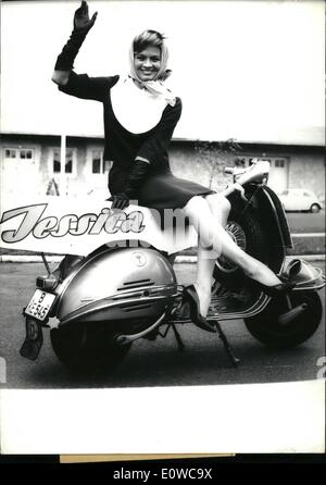 May 05, 1962 - Hollywood - Star Angie Dickinson in Berlin: To the release of the American film ''Jessica'' leading actress Angie Dickinson was coming to Berlin today (10.5.1962). On the air-place Tegel a Vespa escorts received her. She is driving a Vespa in the film ''Jessica'' in the sizilian landscape. Photo shows Angie Dickinson on a Vespa. Stock Photo