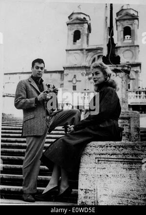 Tony Curtis and his wife Janet Leigh out in London Stock Photo