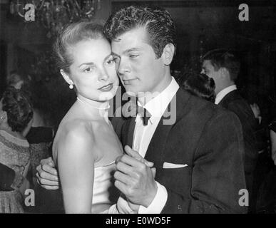 Tony Curtis dancing with his wife Janet Leigh at a party Stock Photo