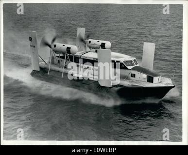 Jul. 07, 1962 - Flying Crab'' hovercraft begins passenger service: History was made yesterday when the 11-ton 24-seater Vickers-Armstrong 3 Hovercraft completed the 19-mile stretch between Wallasey and Rhyl across the Dee estuary in half an hour at a speed of nearly 70 mph. Looking like some giant flying crab it took the first passengers for &pound;2 return. The service is for 8 weeks, possible 14,000 have been sold already. Holiday makers will save up to 1 1/2 hours on the journey. Photo shows a three-quarter serial shot of the VA 3 Hovercraft at speed off the coast of Rhyl. Stock Photo