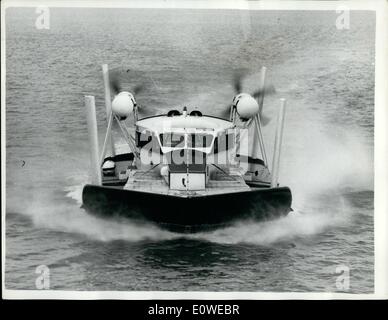 Jul. 07, 1962 - FLYING CRAB'' HOVERCRAFT BEGINS PASSENGER SERVICE: History was made yesterday when the 11-ton 24-seater Vickers-Armstrong 3 Hovercraft completed the 19-mile stretch between Wallasey and Rhyl across the Dee estuary in half an hour at a speed of nearly 70 mph. Looking like some giant flying crab it took the first passengers for &pound;2 return. The service is for 8 weeks, 6-days a week, 6 times a day. 4,000 tickets have been sold out of a possible 14,000. Holiday-makers will save up to 1 1/2 hours. Photo shows: A head-on-view of the Hovercraft at speed seen from the air. Stock Photo