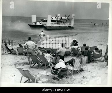 Jul. 07, 1962 - ''Flying Crab'' Hovercraft Begins Passenger Service: History was made yesterday when the 11-ton 24 seater Vickers Armstrong 3 Hovercraft completed the 19-mile stretch between Wallasey and Rhyl across the Des estuary in half an hour at a speed of nearly 70 mph. Looking like some giant flying crab it took the first passengers for 2 return. The service is for 8 weeks, 6-days a week, 6 times a day. 4,000 tickets have been sold out of a possible 14,000. Holiday-makers will save up to 1 1/2 hours Stock Photo