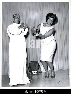 Aug. 08, 1962 - Moroccan Roll: New York International Airport, World famous dancer Katherine Dunbam is shown dancing with 18-year-old Ali Abderrahman, one of the fourteen Royal Dancers from the Court of Morocco who arrived by TWA Super Jet from Paris. The troupe came to the U.S. after ten years of negotiations by Miss Dunham with King Hassan II of Morocco, and will tour the U.S. in a new show with her for thirty-eight weeks. Stock Photo