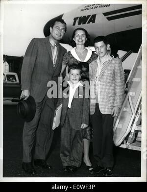 Aug. 08, 1962 - New York International Airport: Actress Cyd Charisse is shown with husband, singer Tony Marin and son Tony, Jr., who greeted her at the Trans World Flight Center on her arrival by TWA SupreJet from Los Angeles. She will spend a week in New Work promoting her new MGM Film, ''Two Weeks in another Town' Stock Photo