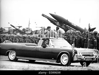 President Kennedy drives past 15000 soldiers Stock Photo