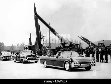 President Kennedy drives past 15000 soldiers Stock Photo