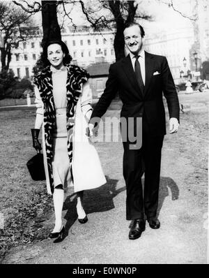 Actor David Niven walks with wife Hjordis Stock Photo