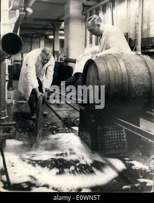 Oct. 05, 1963 - Five million pints of beer wasted because of a strike ? Two hundred and fifty thousand pints of beer went down the drain yesterday at Ansell?s Brewery at Birmingham and it is to be followed by another five million pints within the next few days. The reason? Said the spokesman for the firm: The beer has become spoiled because 1,300 production and transport workers at the brewery went on strike claiming that a cellarman shop steward had been victimized. Photo Shows: Some of the beer going down the drain at the brewery yesterday. Keystone Stock Photo