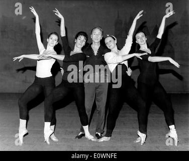 George Balanchine with his dancers during a rehearsal Stock Photo