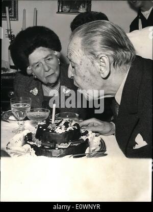 Jan. 01, 1964 - Somerset Maugham 90: On his 90th birthday Somerset Maugham had lunch with Lady Doverdale at her apartment at the Schuykill Building, a 16 storied ultra-modern apartment house in Monte Carlo. Photo shows Somerset Maugham blowing out the only candle of his birthday cake. Stock Photo