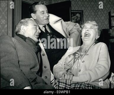 Jan. 01, 1964 - ''THE RELUCTANT PEER''. WILLIAM DOUGLAS-HOME, playwright brother of Prime Minister SIR ALEC DOUGLAS-HOME, has written a play about a storybook British peer who gives up his title to stand for Parliament as Prime Minister (as did SIR ALEC). The play, entitled ''The Reluctant Peer'' will open at London's Duchess Theatre on January 15th. PHOTO SHOWS: Author WILLIAM DOUGLAS-HOME (centre) makes a comment to cause laughter to NAUNTON WAYNE who plays the Earl of Lister, and DAME SYBIL THORNDIKE who plays Countess of Lister. Stock Photo