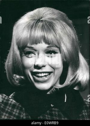 Feb. 02, 1964 - Young actress Mireille Darc is the latest co-star of ''Mister'' Jean Gabin: Young actress Mireille Darc was selected to be the co-star of Jean Gabin in the latter's film ''Mister'' directed by Jean Paul Le Chanois. Her charm easily conquered the great old man of the French movies who in this film will play the part of a rich banker that twist of fate make him a servant. Photo shows Mireille Darc as she appears opposite Jean Gabin in Mister. Stock Photo