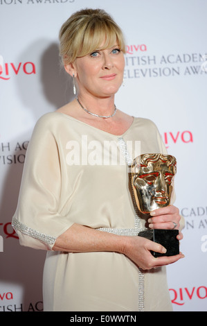 Sarah Lancashire poses for photographers in the winners room at the