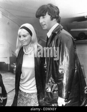 Beatles singer John Lennon at airport with Cynthia Stock Photo