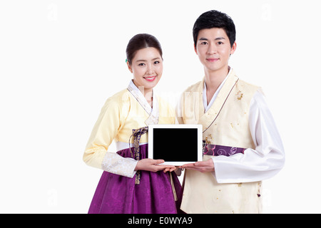 a couple wearing traditional Korean outfits Stock Photo