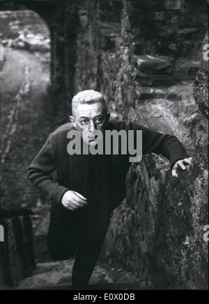 Nov. 11, 1964 - Situation hopeless but not Serious .: That is title of a new film with Alec Guinness (Alec Guinnes) which is made at the Bavaria- Film Ã¢â‚¬â€œStudio in Munich- Gieselgasteig at present. The film, produce and directed by Gottfried Reinhardt for Paramount Pictures Release, is based on the best-selling Novel The Hiding Place of Robert Shaw. Sir Alec Guinness takes the title-part of Mr. Frick, a German Shop-Keeper and air-raid Warden during the II. World War who captured and Befrieded two American Pilots. Stock Photo