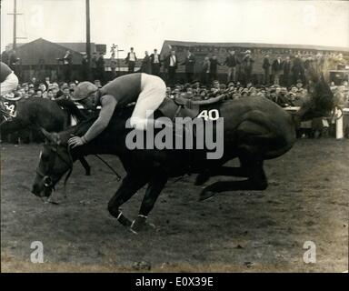 Mar. 03, 1965 - An American Horse wins the 1965 Grand National at Aintree- Liverpool today: The American horse Jay Trump, ridden by Crompton smith, beat the favourite ''Freddie'' in a thrilling finish to win the 1965 Grand National Chase at Aintree, Liverpool today. ''Mr. Jones'' was placed third. Picture Shows:Leslie, ridden by P. Jones stumbles badly at bechers the second time round but he managed to regain his seat and carry on. Stock Photo