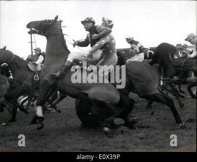Mar. 03, 1965 - An American Horse Wins The Grand National At Aintree: The American horse Jay Trump, ridden by Crompton Smith, beat the favourite Freddie in a thrilling finish to win the Grand National Chase at Aintree today. Mr. Jones was placed third. Photo shows Forgotten Dreams, ridden by Mr. W. Molernon, falls and crashes into the rear of Sword Flash, ridden by T. Ryan as they come over Bechers the first time round. Stock Photo