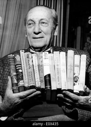 French reporter, translator, and novelist MAURICE DEKOBRA with several of his books. AKA Maurice Tessier, Stock Photo