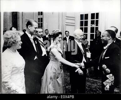 May 20, 1965 - Queen And Prince Philip On State Visit To Germany: H.M. The Queen and Prince Philip on the first day of their State visit to West Germany (Tuesday, May 18), attended a Reception given in their honour by President and Frau Lubke, at the Schloss Augustusburg, Bruhl. Photo shows H.M. The Queen meets The Ambassador of Liberia, Mr Wiles, at the Reception. On left is Frau Lubke and Prince Philip, and in centre, President Lubke. Stock Photo