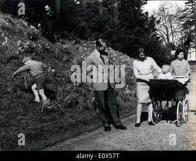 Apr. 04, 1965 - New Birthday Pictures of H.M. The Queen and Family at Frogmore.: H.M. The Queen and Princess Anne watched the pram containing baby Prince Edward (aged 1) watched by the Duke of Edinburgh - while four year old Prince Andrew goes for a run up the bank - in the grounds of Frogmore - the Royal Residence below Windsor. Picture taken to mark the 39th. birthday of H.M.The Queen on April 21st Stock Photo