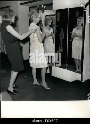 Jun. 06, 1965 - Michele Morgan in the dress of her new film: Famous French actress Michele Morgan was trying yesterday at the Paris Dressmaker's, Sheffer, the dress she will wearon in her next film ''The Centurions', the turning of which will start on July, also with famous actors Anthony Quinn, Alain Delon, Claudia Cardinale and Maurice Ronet. Michele Morgan trying her new dress in the Paris saloons of Sheffer. Stock Photo