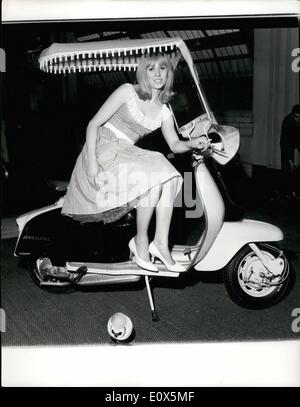 May 05, 1965 - THE SCOOTER WITH THE FRINGE ON TOP. PHOTO SHOWS:- The scooter with the fringe on top comes to Blackpool for the International Cycle and Motor Cycle Show which opened there today. 20-year old Donna White, of Huntington, takes advantage of the new fashion. Stock Photo