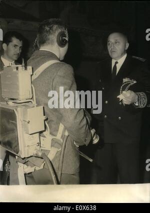 May 05, 1965 - A ''Spaceman'' At The Town Hall? Photo shows Am Amusing Snapshot Taken During The Reception Of M. Helou, Lebanon's President, At The Town Hall To-Day. M. Haas-Picard, Prefect Of The Seine Department (Right, In Uniform) Seems To Be Taken A Back At The Sight Of The Man Looking Very Much Like A Spaceman. The Truth Is That The ''Spaceman'' Was Nobody Else Than The T.V. Operator Complete With His Equipment And Cameras. Stock Photo