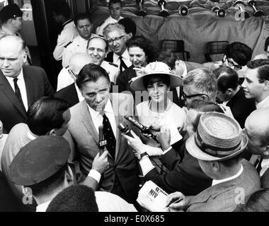 Actress Elizabeth Taylor and husband actor Richard Burton being interviewed Stock Photo