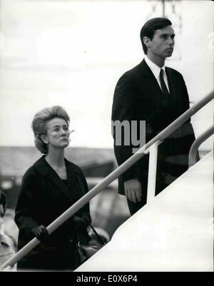 Jul. 07, 1965 - Adlai Stevenson Body Taken Home: Escorted by a special delegation led by the U.S. Vice-President, Senator Hubert Humphrey the body of Adlai Stevenson, who died in London last night, was flown to the United States this afternoon. Photo Shows Boarding the aircraft at London airport today, are Adlai Stevenson's son, John, leading American diplomat, Mrs. Marietta Tree, who gave the kiss of life to Adlai Stevenson when he collapsed in London last night. Stock Photo