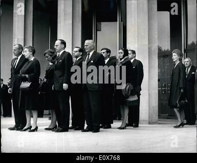 Jul. 07, 1965 - Adlai Stevenson's body goes to U.S. Mrs. Marietta Tree and Family Mourners: Escorted by a special delegation led by United States vice-president. Mr. Hubert Humphrey, the Body of Adlai Stevenson, who died in London last night, was being flown back to the United States today. Photo Shows The family headed by leaving the American Embassy, headed by on their way to the airport. On the extreme right, is Mrs. Marietta Tree, the American diplomat who gave Adlai Stevenson the Kiss of life when he collapsed while at walking with her in London last night. Stock Photo