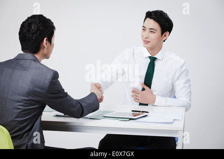 two business men shaking hands Stock Photo