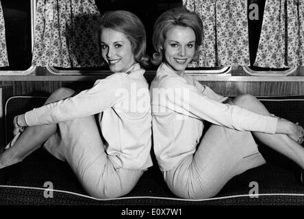 Portrait of the Kessler Twins sitting back to back Stock Photo