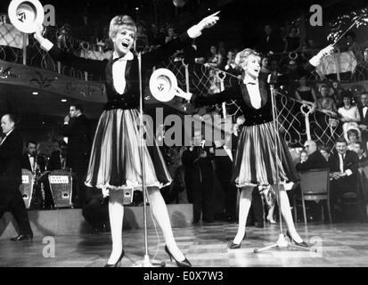 Performing Duo The Kessler Twins singing during a show Stock Photo