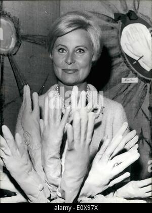 Oct. 10, 1965 - Golden Glove To Michele Morgan Michele Morgan, the famous French sen actress, was awarded the ''Golden Glove' Stock Photo