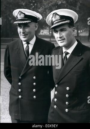 Oct. 10, 1965 - Commanding officer of Bhatain's first polaris Submarine H.M.S. Resolution.: Two Royal Navy Commanders who served together as Lieutenants in the submarine Alcide during 1952, have been appointed to command the two orews of Britain'sfirst polar submarine, H.M.S. Resolution. They are Commander Michael Charles Herey, 37 and commander Kenneth David Frewer, 35. Photo Shows Commander Kenneth David Frewer (left) and commander Michael Charles Henry, Pictured together in London today. Keystone. Stock Photo