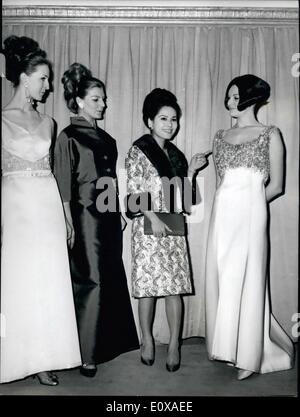 Jan. 01, 1966 - Mrs. Ratna Sari Dewi, Sukarno's wife, who is in for little stay, visited the atelier of the Fontana sister, to renew her collction. Photo shows Mrs. Ratna Sari Dewi Sukarno between the Fortana's mannnequins. Stock Photo